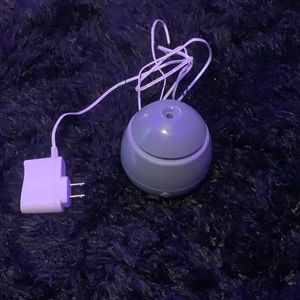 a mini humidifier & essential oils defuser, comes with cord